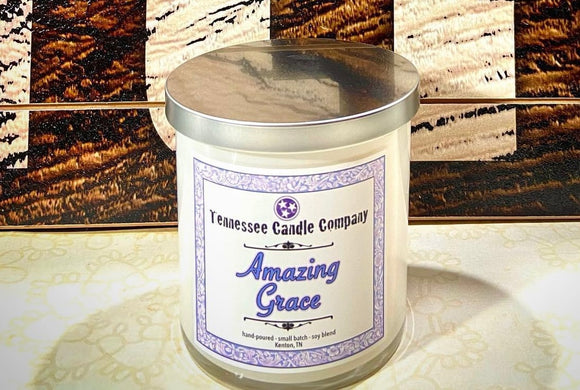 Amazing Grace, cotton wick white glass tumbler candle, by Tennessee Candle Company.